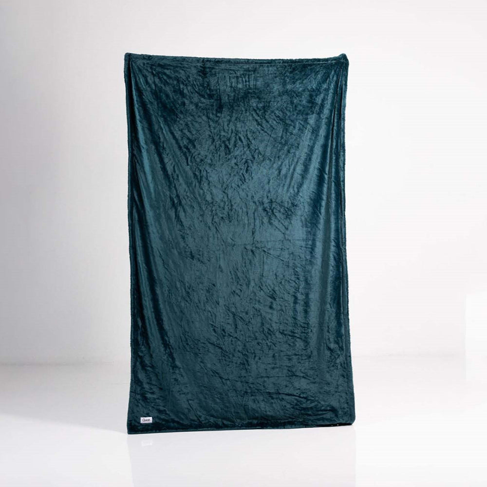 Splash Blanket Furlush Medium Waterproof Throw Emerald Green on display, showcasing its soft velvet texture.