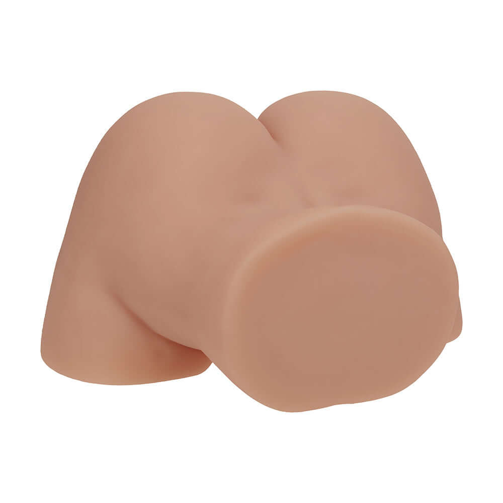 Xkin Bodyforms Lux Arden Dual Entry Vibrating Masturbator Tan viewed from the side, showcasing its realistic design and material.