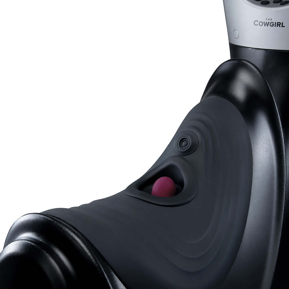 Close-up view of The Cowgirl Thrust Rider Premium Sex Machine showcasing its sleek design and controls.