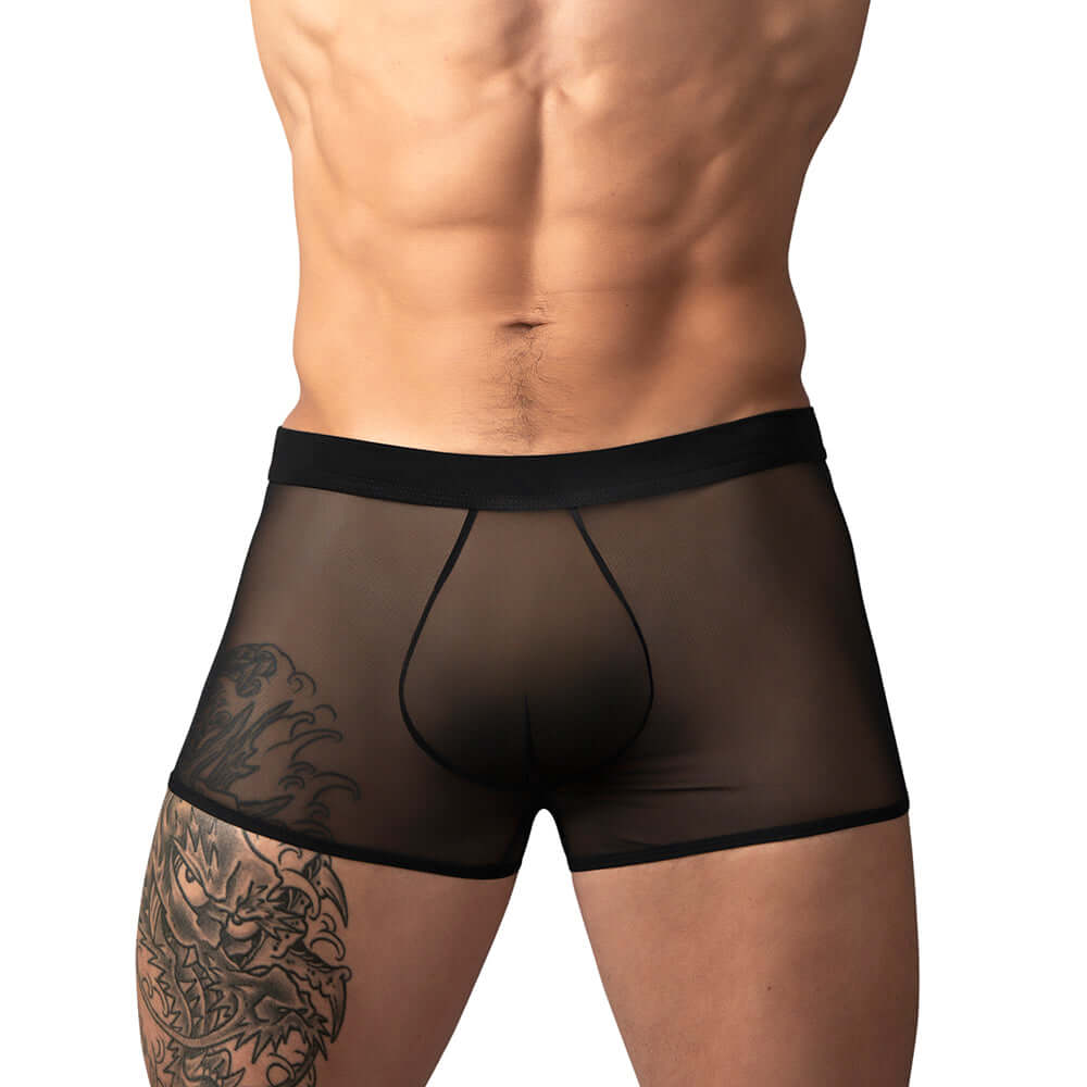 Male Power Mesh 2.0 Mini Short Black XL showcased on a model with a tattoo, highlighting its breathable fabric and low-rise fit.