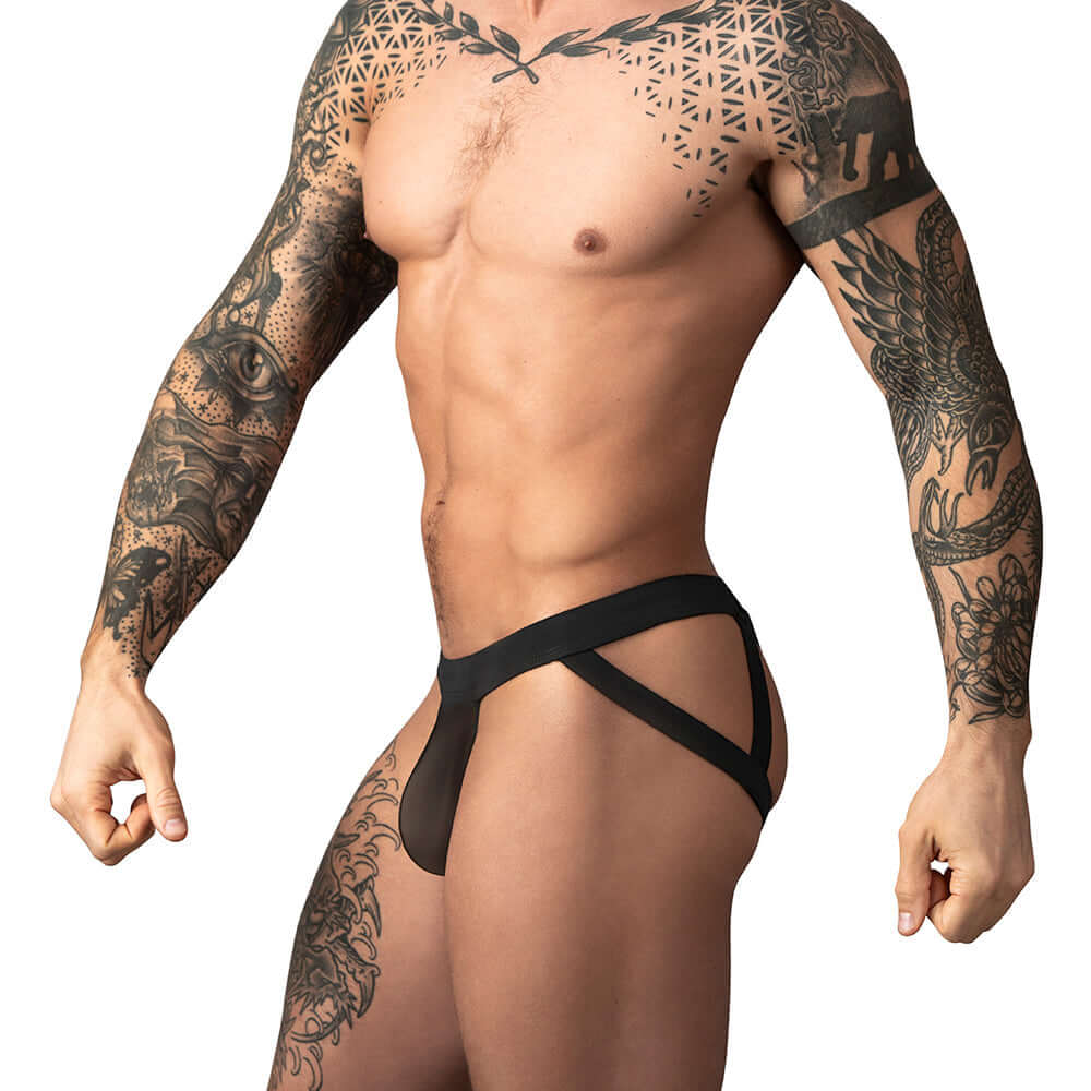 Male Power Mesh 2.0 Strappy Ring Jock Black L XL showcasing a model with tattoos, featuring a stylish design and lightweight fabric.