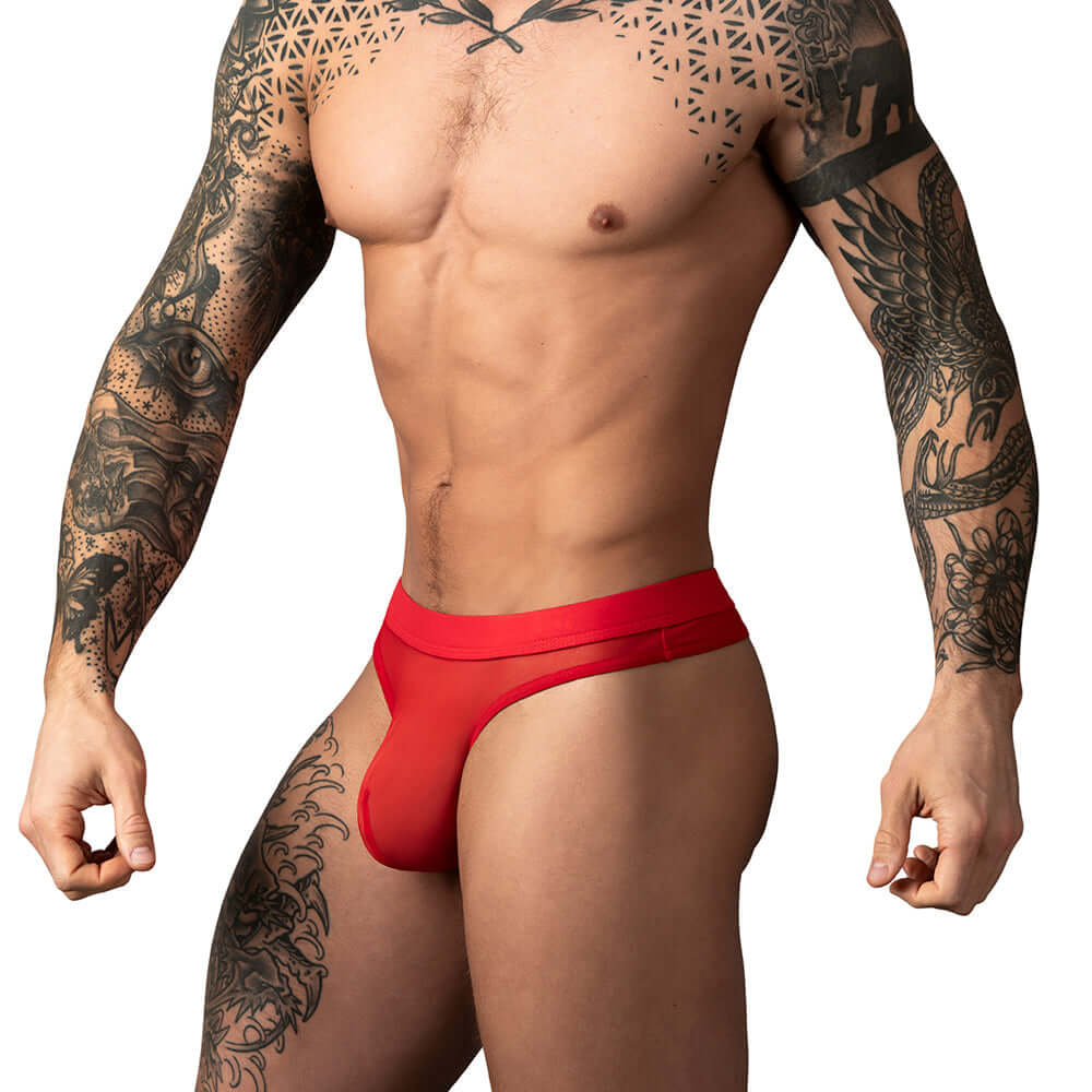 Male Power Mesh 2.0 Bong Thong Red L XL displayed on a muscular model showcasing its design and fit.