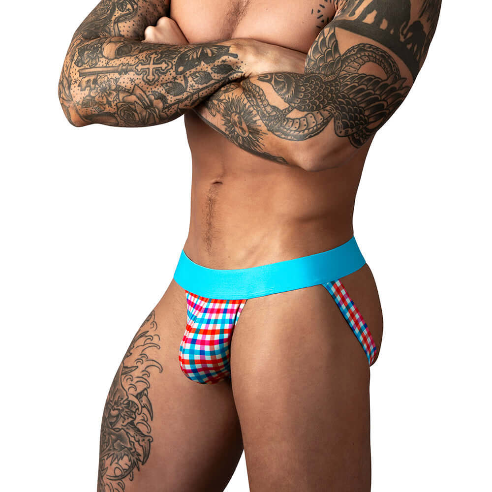 Male Power So Cumfy Gingham Jock Turquoise L XL on a model with tattoos, showcasing stylish comfort and athletic support.