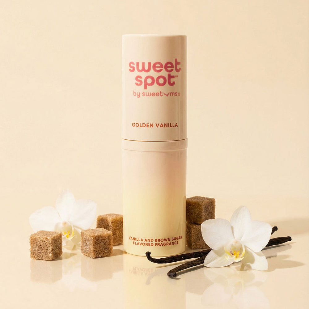 Sweetums Sweet Spot Flavored Fragrance Golden Vanilla with floral elements and sugar cubes.