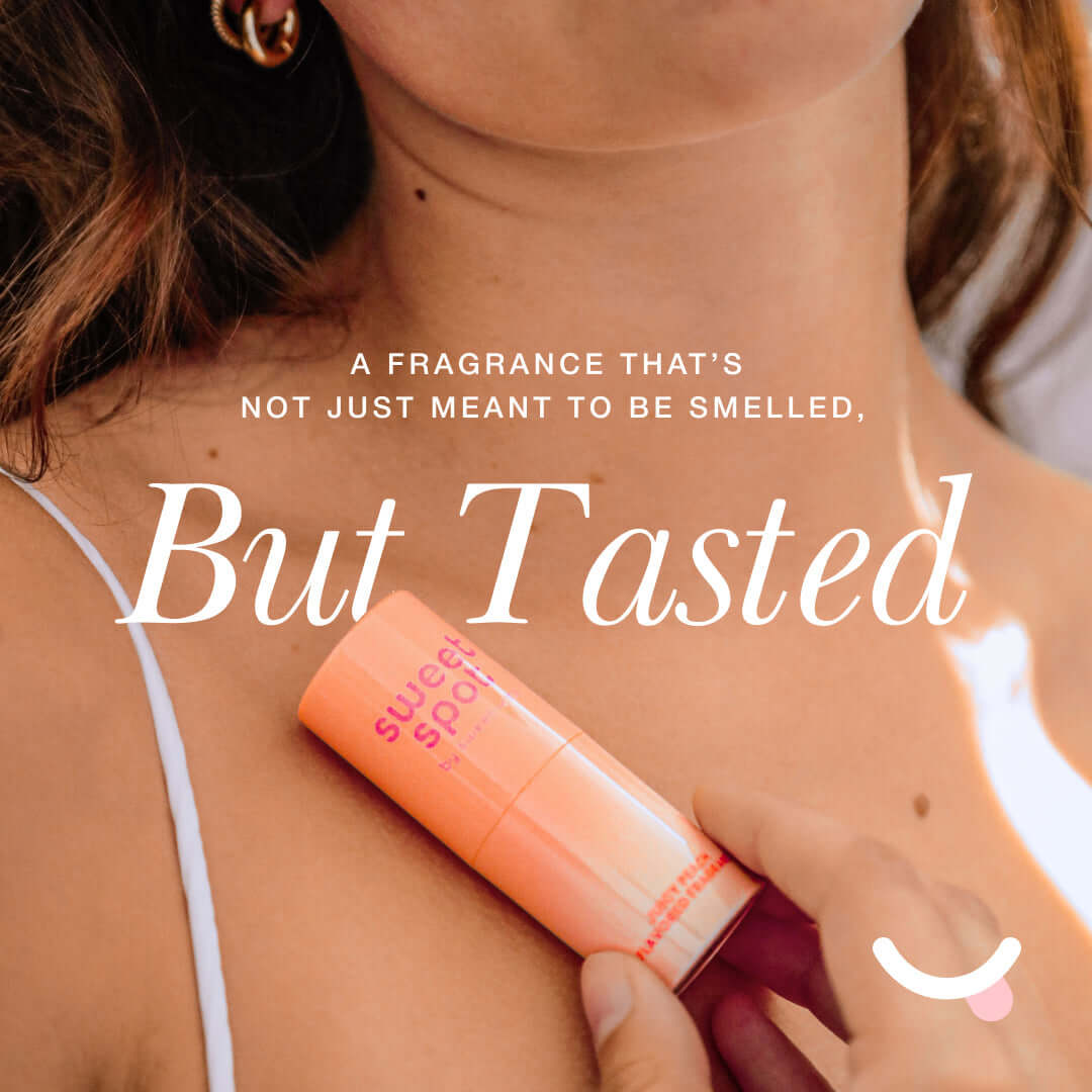 Sweetums Sweet Spot Fragrance Pineapple Coconut Crush solid fragrance stick on skin, emphasizing taste and scent.