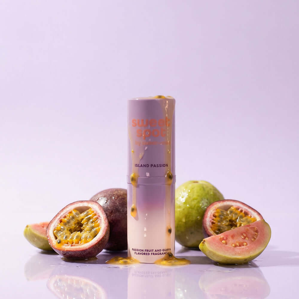 Sweetums Sweet Spot Flavored Fragrance Island Passion with passion fruit and guava on a pastel backdrop.