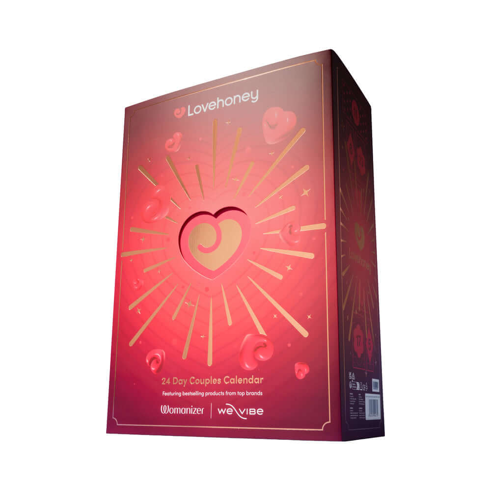 Lovehoney Womanizer We-Vibe Couples Advent Calendar 2026 packaging featuring heart design and 24-day couples calendar.