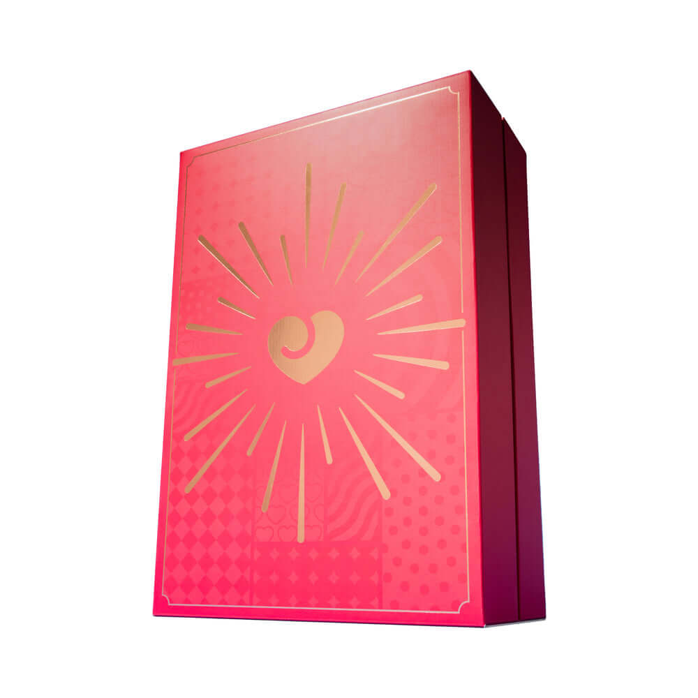 Lovehoney Womanizer We-Vibe Couples Advent Calendar 2026 stunning design with heart and sunburst pattern.