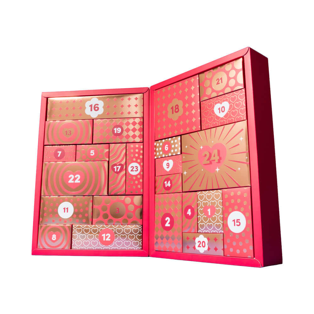 Lovehoney Womanizer We-Vibe Couples Advent Calendar 2026 open with numbered doors revealing enticing surprises.