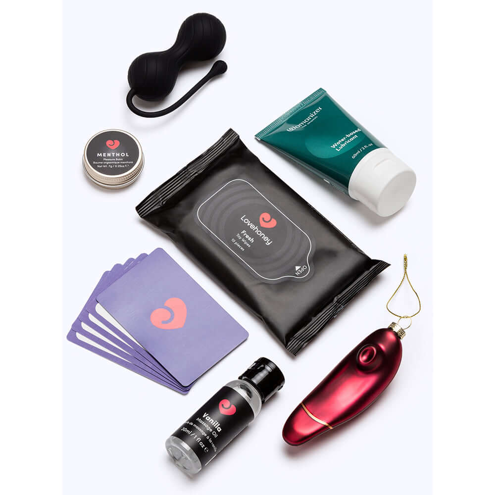 Lovehoney Womanizer We-Vibe Couples Advent Calendar 2026 featuring intimate wellness products and accessories.