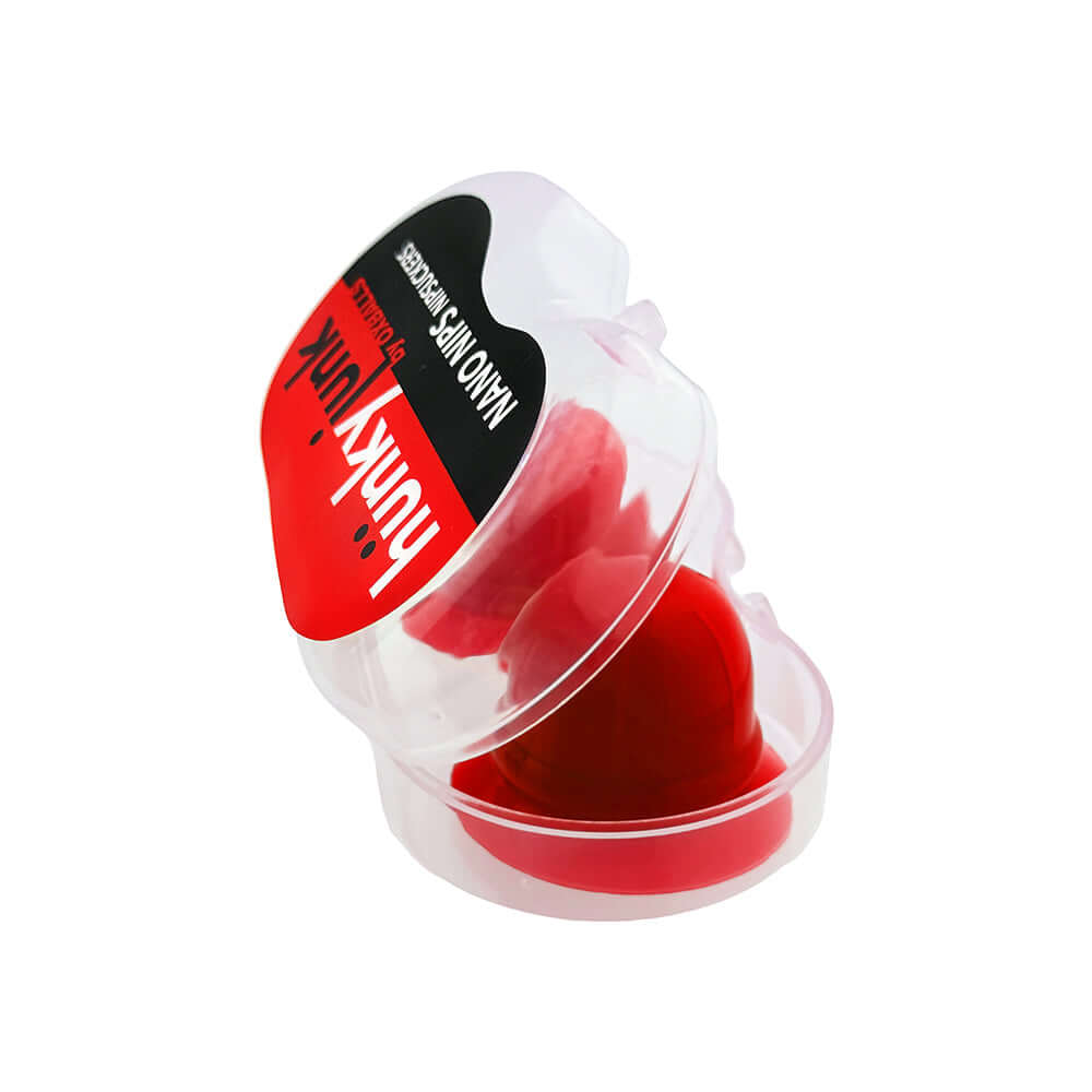 Hunkyjunk Nano Nips Nipple-nubs Red Silicone in transparent packaging; compact silicone nipple suction cups for enhanced sensitivity.