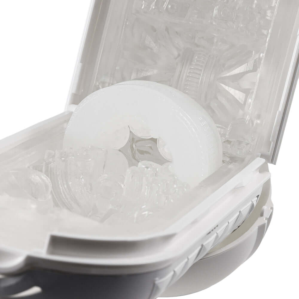 Tenga Flip Flexy Male Stroker opened to reveal malleable material and spiral-ribbed casing for dynamic pleasure.
