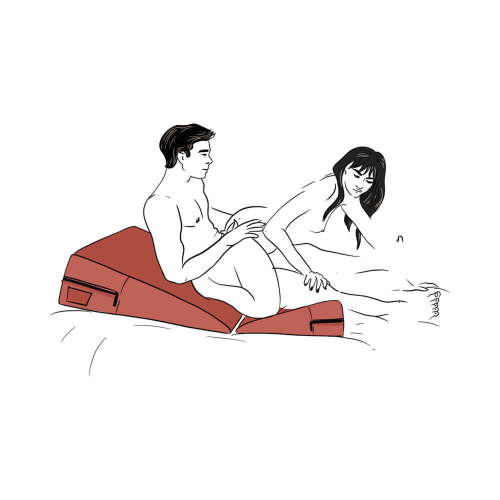 Couple using the Liberator Wedge & Ramp Sex Combo Original Size Red for intimate comfort and support.