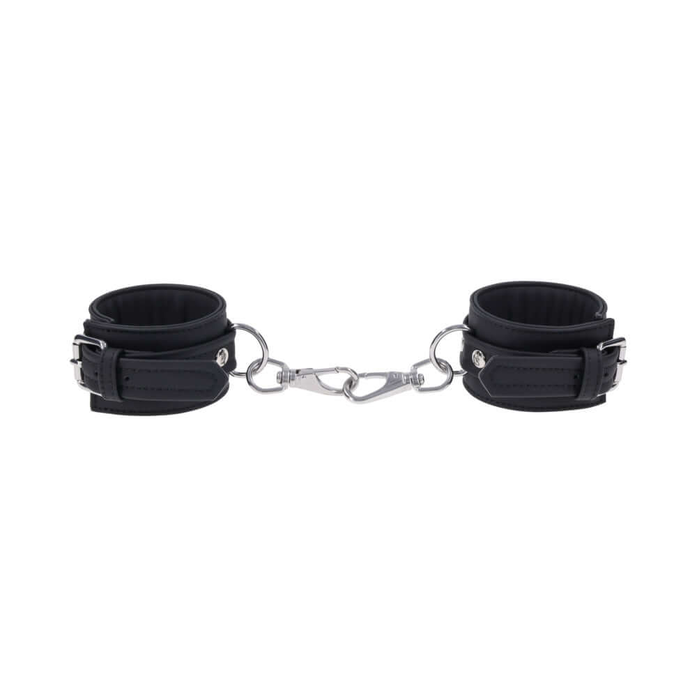Sportsheets Signature Midnight Muse Handcuffs in black silicone with silver hardware for sophisticated restraint play.