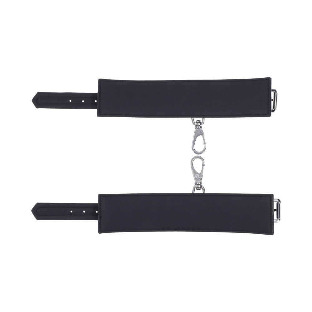 Sportsheets Signature Midnight Muse Handcuffs featuring soft silicone and sleek silver hardware.