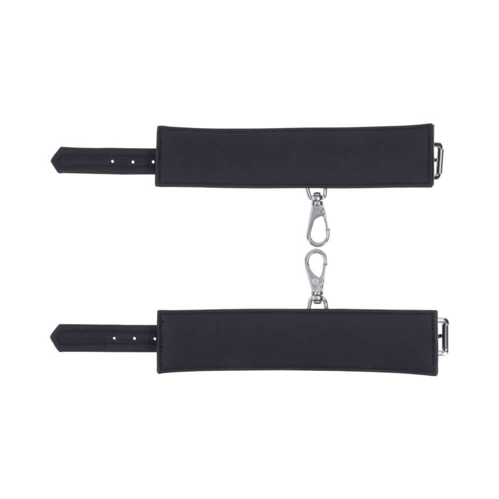 Sportsheets Signature Midnight Muse Handcuffs featuring soft silicone and sleek silver hardware.