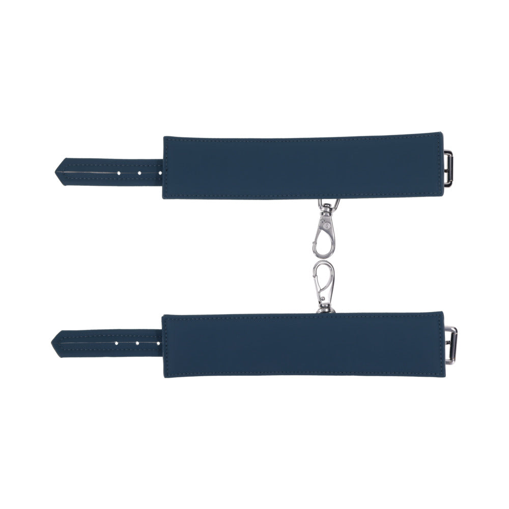 Sportsheets Signature Twilight Tease Handcuffs featuring soft silicone and sleek silver hardware.