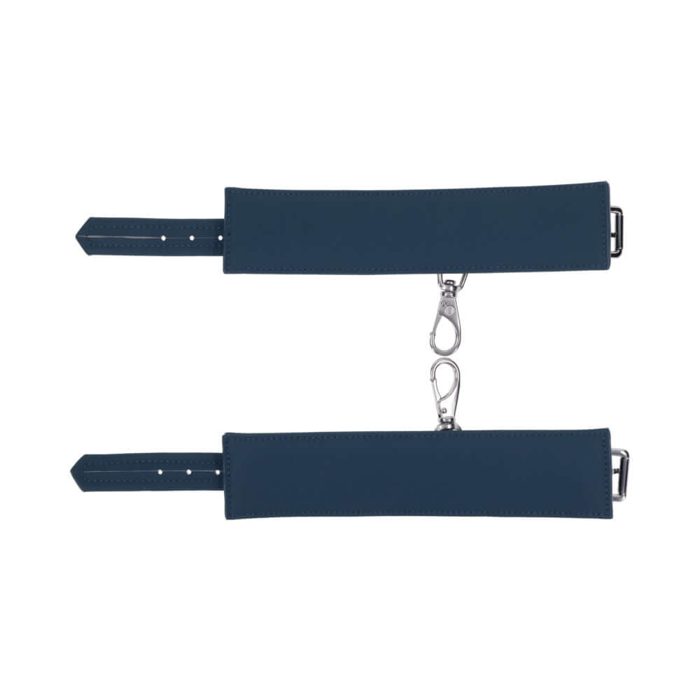 Sportsheets Signature Twilight Tease Handcuffs featuring soft silicone and sleek silver hardware.