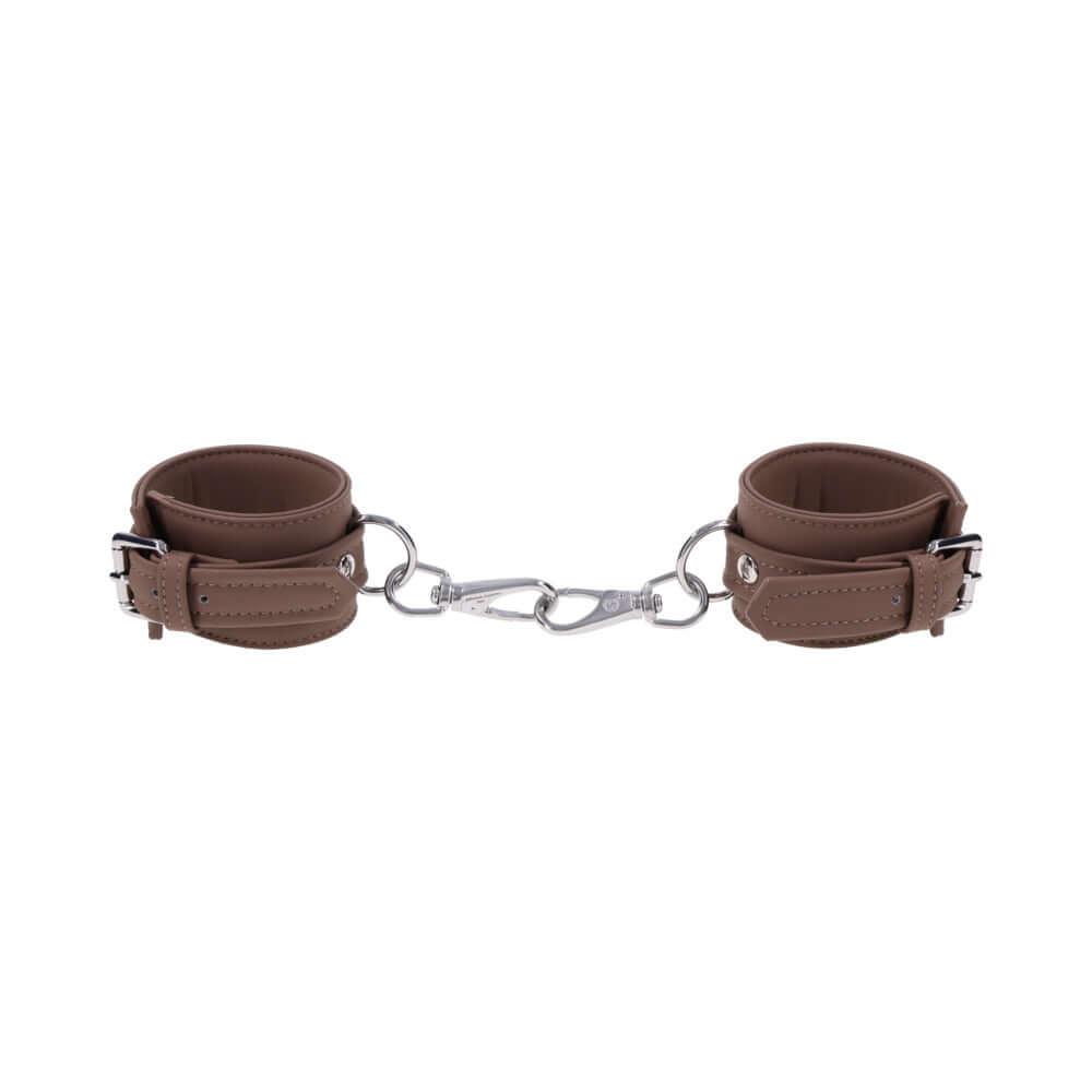 Sportsheets Signature Dawn Dream Handcuffs in soft silicone with silver hardware for restraint play.