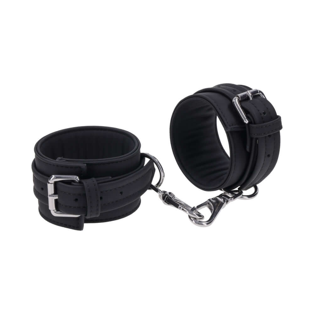 Sportsheets Signature Midnight Muse Ankle Cuffs featuring soft silicone and silver-tone hardware for stylish restraint play.