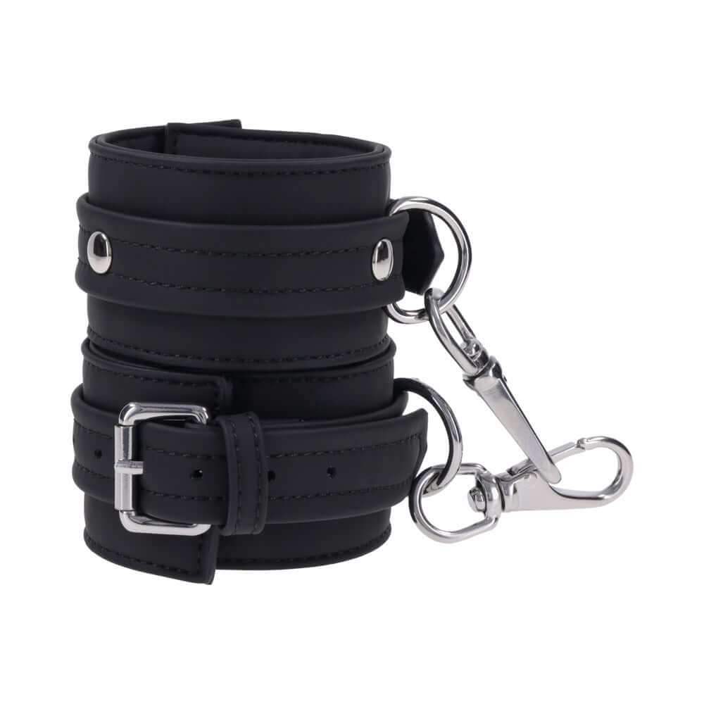 Sportsheets Signature Midnight Muse Ankle Cuffs featuring sleek black silicone and silver-tone hardware.