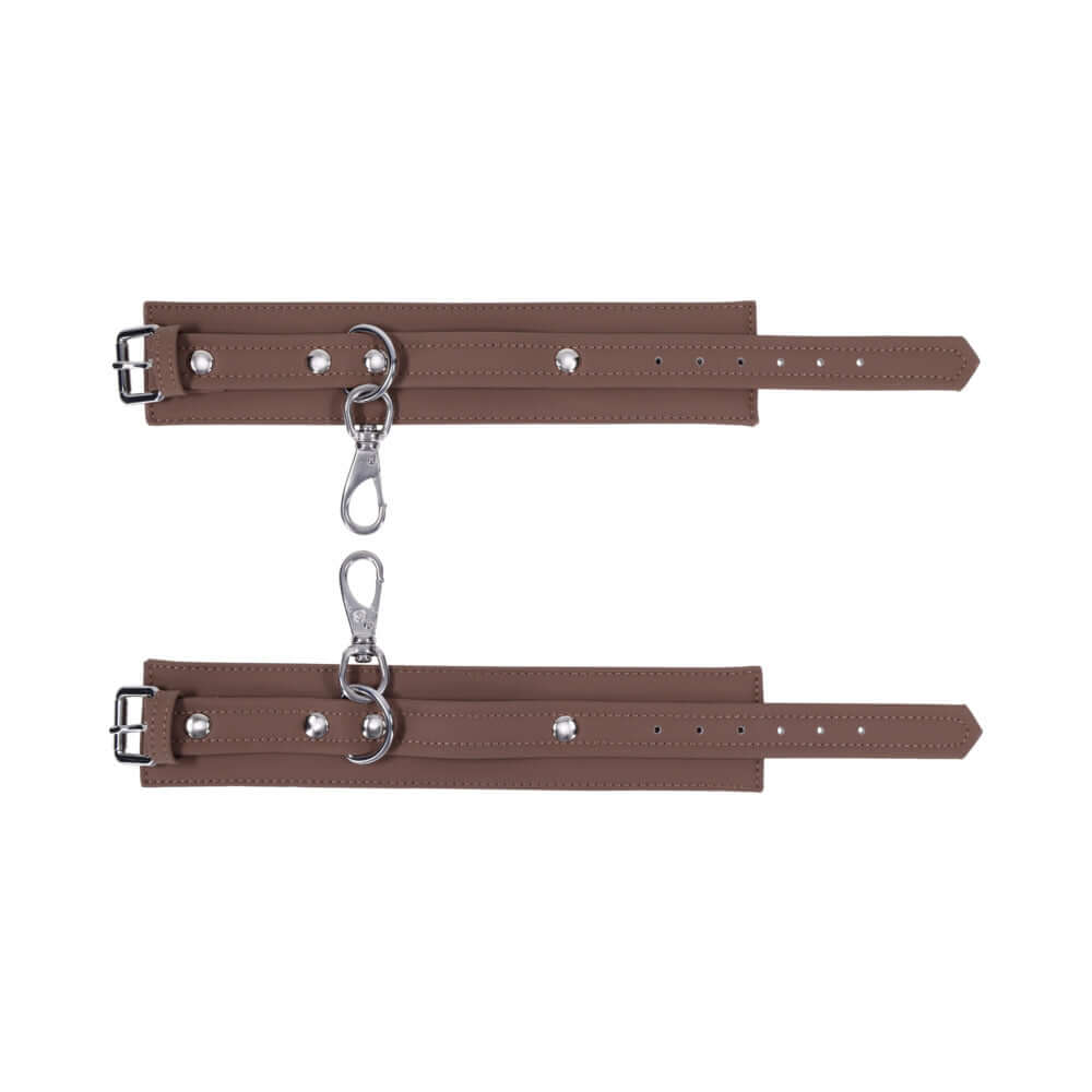 Sportsheets Signature Dawn Dream Ankle Cuffs featuring soft silicone and silver hardware for comfortable restraint play.
