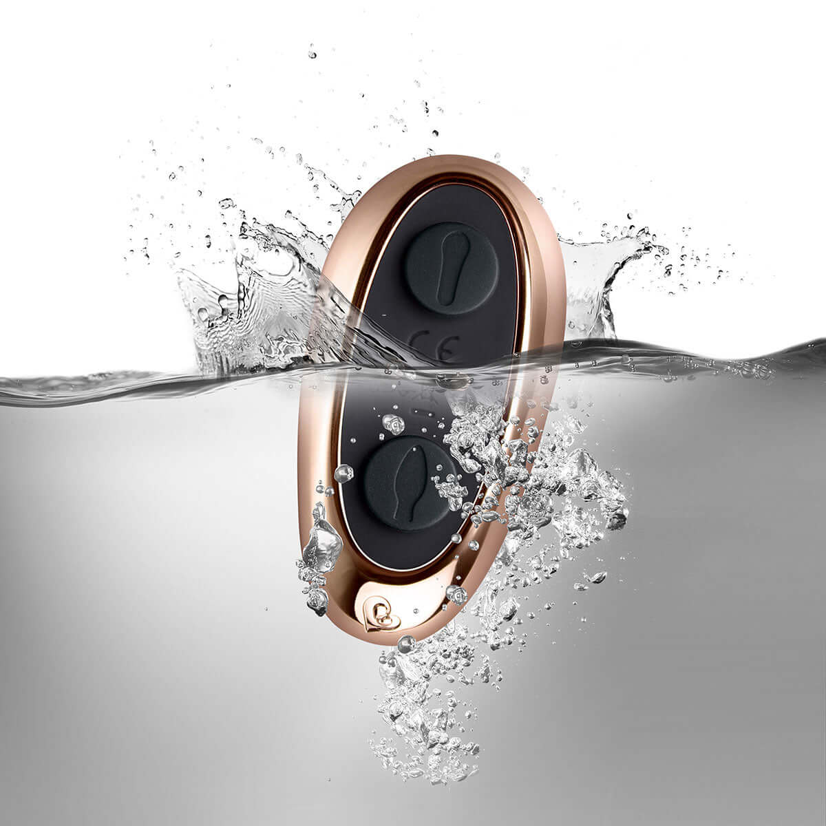 Cocktail Couples Vibrator with Remote Control submerged in water, showcasing its waterproof design and sleek remote.