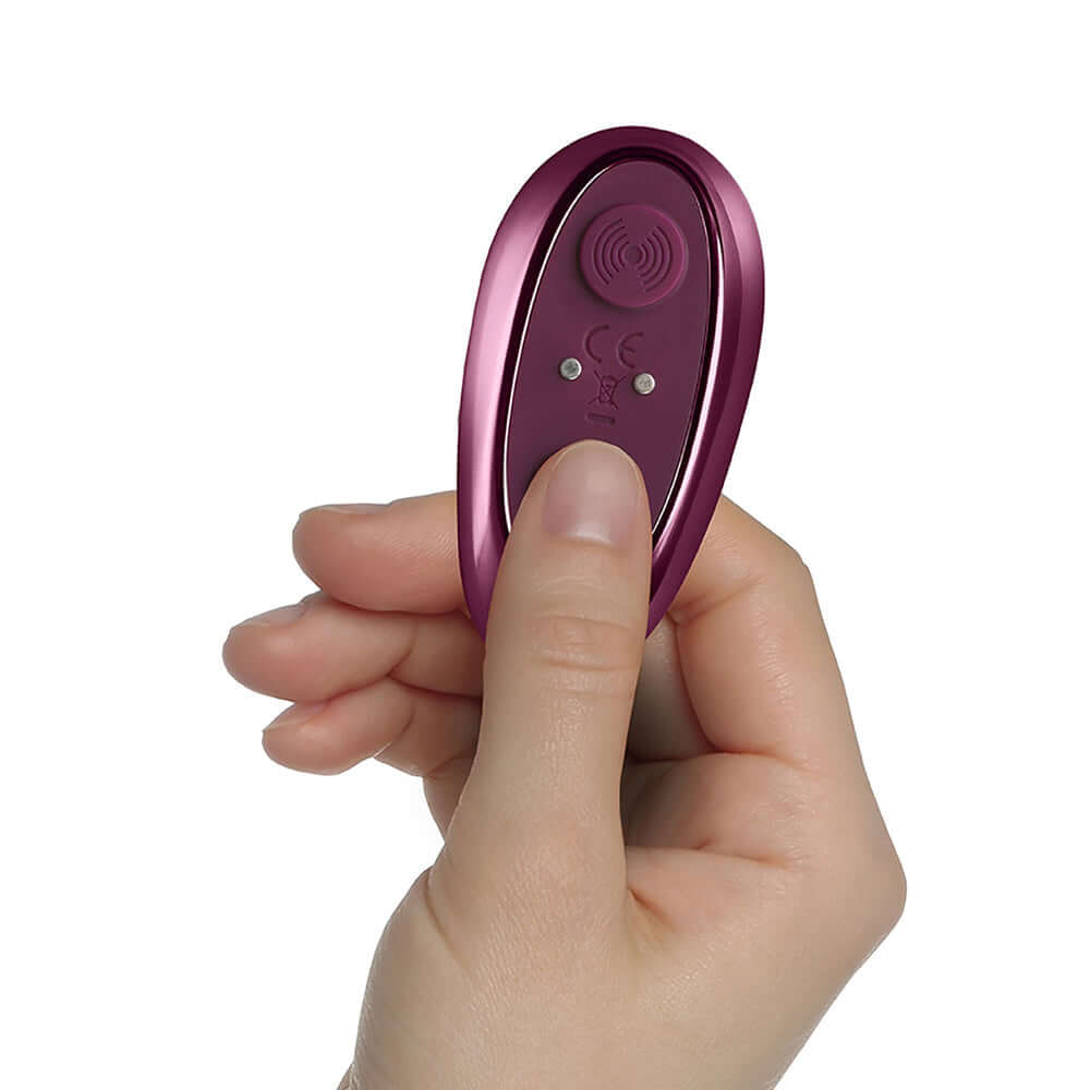 Close-up of the remote control for the Knickerbocker Glory Panty Vibe Burgundy, designed for hands-free stimulation.