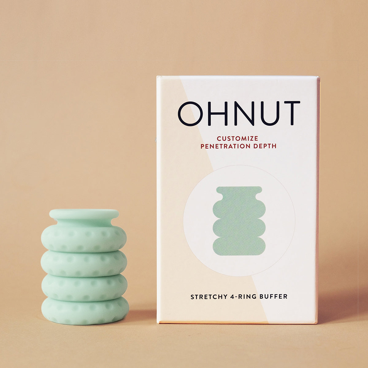 Ohnut Depth-Limiting Rings 4-Pack Jade with packaging showcasing customizable penetration depth.