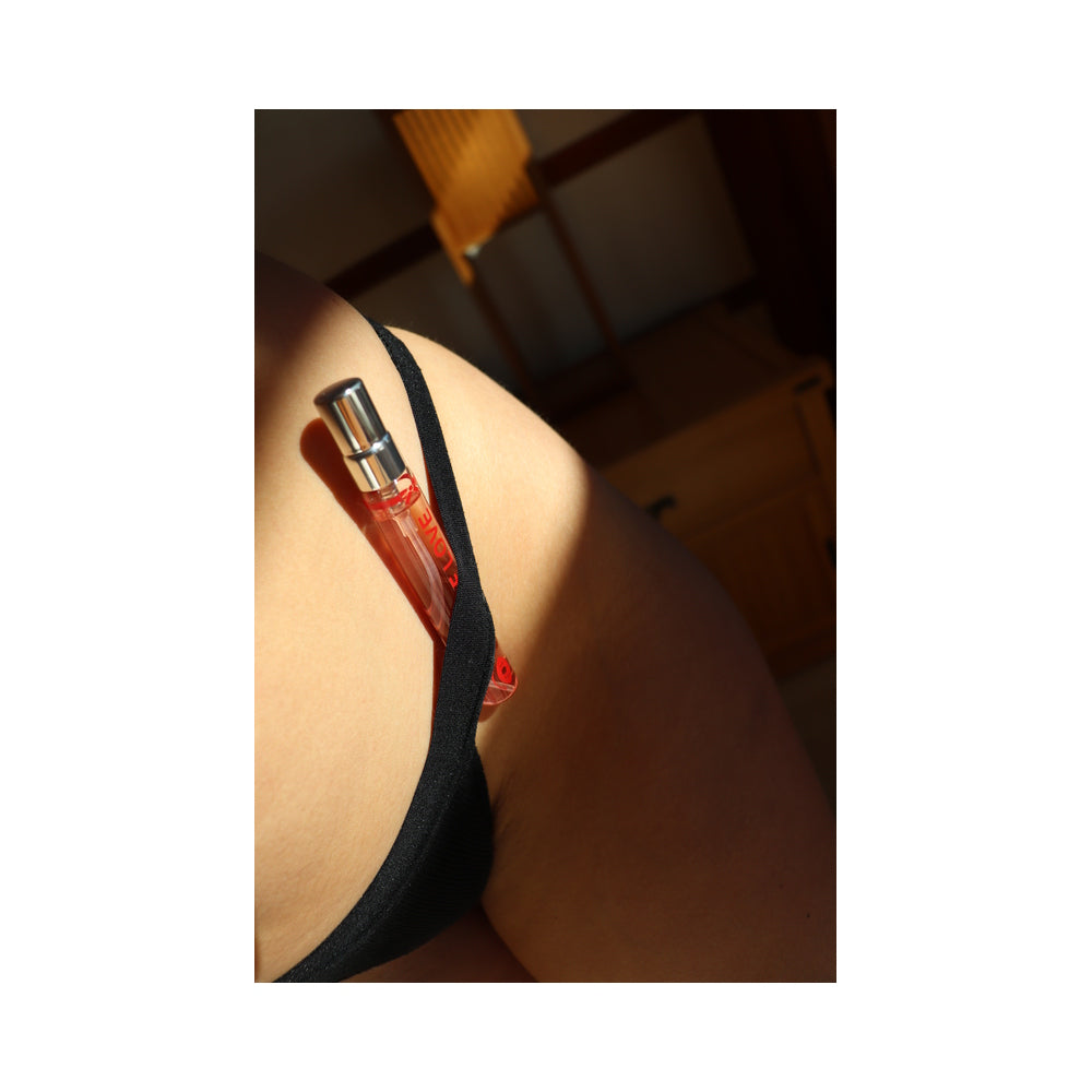 Eye of Love One Love Attract Him Pheromone Parfum 10 ml bottle elegantly displayed in a close-up image.