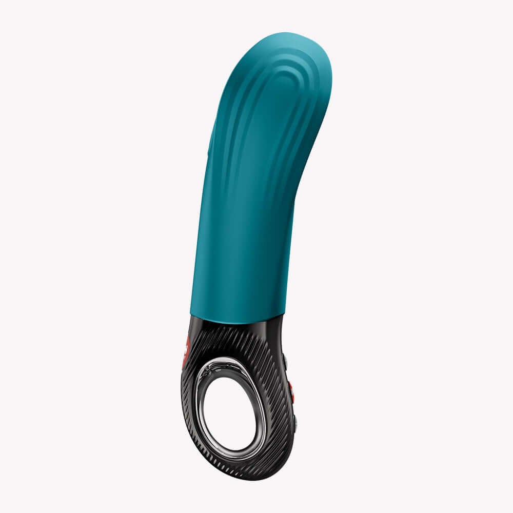 Fun Factory Manta Vibrating Masturbator Bottle Green showcasing its flexible wings and grooved structure.