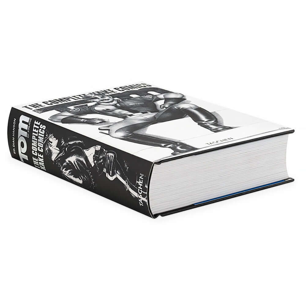 Tom of Finland The Complete Kake Comics hardcover edition showcasing the spine of the book with iconic artwork.