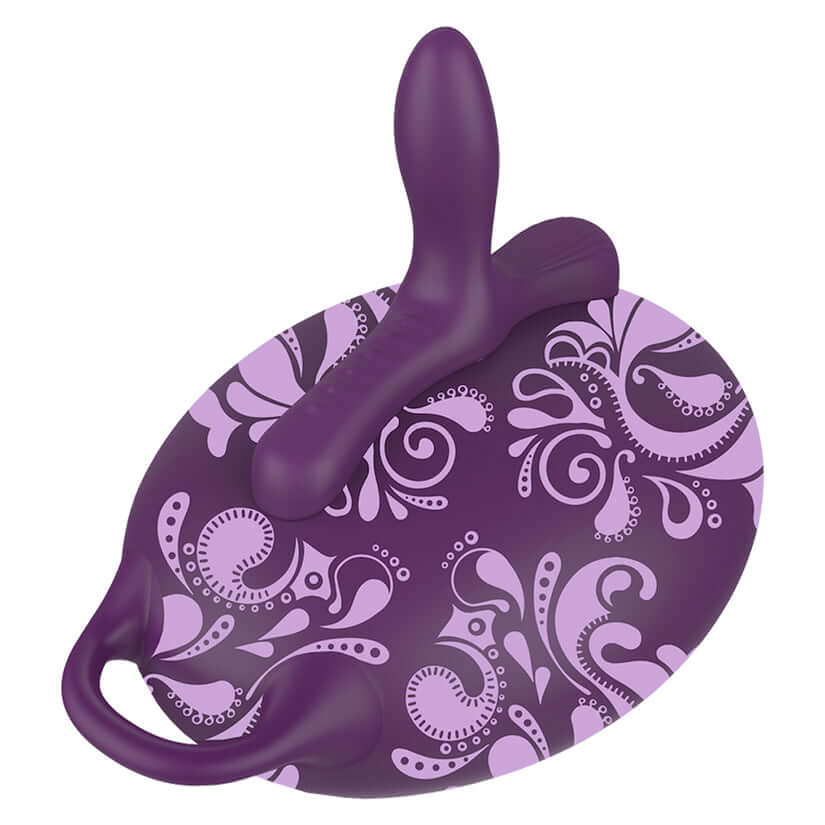 Bouncybliss Classic Vibrator Purple on a patterned base, designed for hands-free stimulation and customizable positioning.