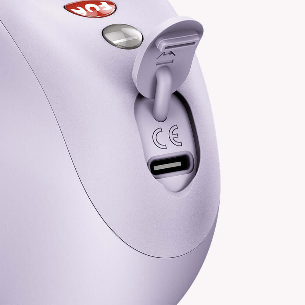 Close-up of the charging port of Fun Factory Mea Air Pulse Clitoral Vibrator Purple, showcasing its modern design.
