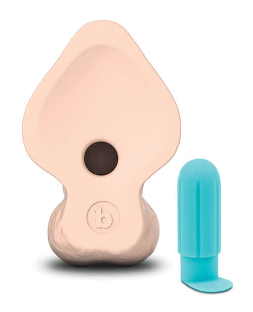 b-Vibe Slipskin 9 inches Curvy Dildo Cream next to a blue bullet vibrator on a white background.
