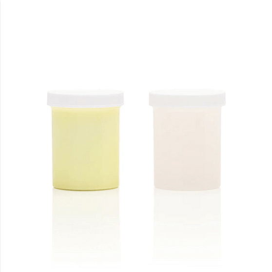 Clone-A-Willy Silicone Refill Glow In The Dark Green product containers, including a yellow and a clear jar.