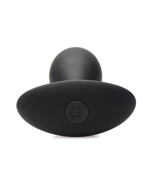 Rooster Rumbler Vibrating Silicone Anal Plug Large Black from a top view, showcasing its firm body and power button.
