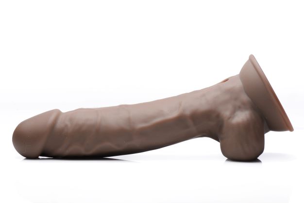 Fleshstixxx 8 Inch Vibrating Dildo With Balls Dark showcased in a lifelike design with flexible silicone material.