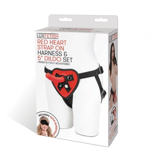 Lux Fetish Red Heart Strap On Harness 5 Inch Dildo Set in packaging, featuring a red heart design and adjustable straps.