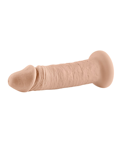 Evolved 6 Inch Vibrating Silicone Dildo Ivory displayed from the side, showcasing its realistic texture and design.
