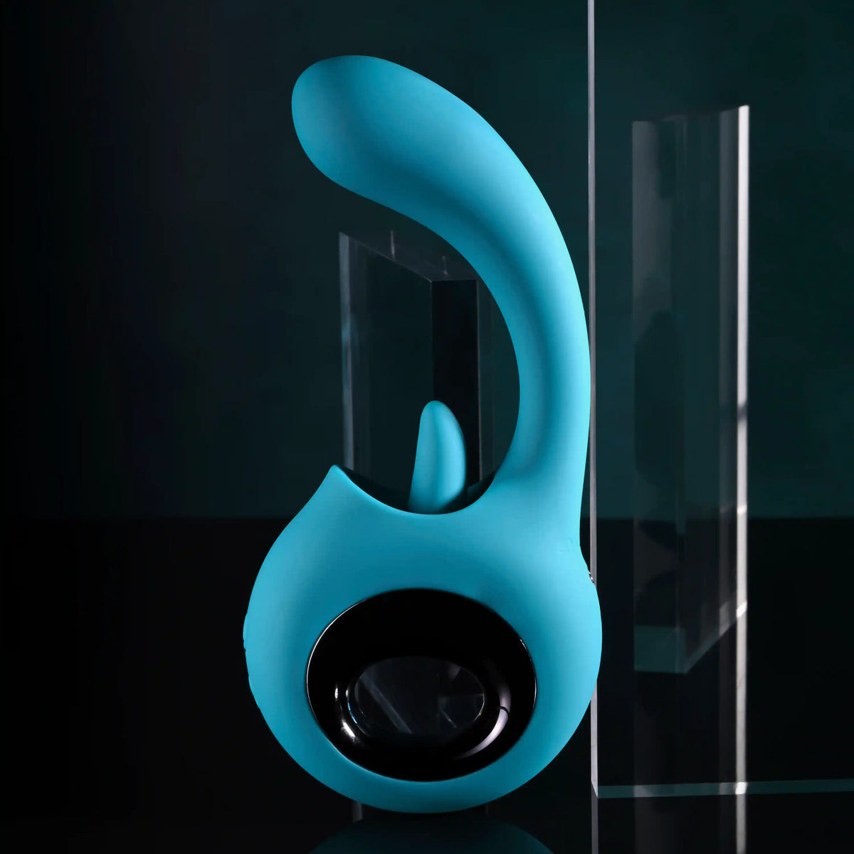 Evolved How Many Licks Silicone Vibrator Blue showcasing its unique design and colors against a dark background.