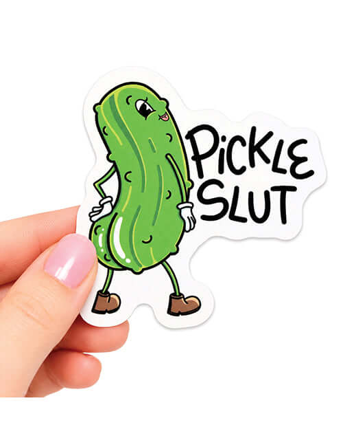 Hand holding a Pickle Slut Funny Vinyl Sticker with a cartoon pickle character.