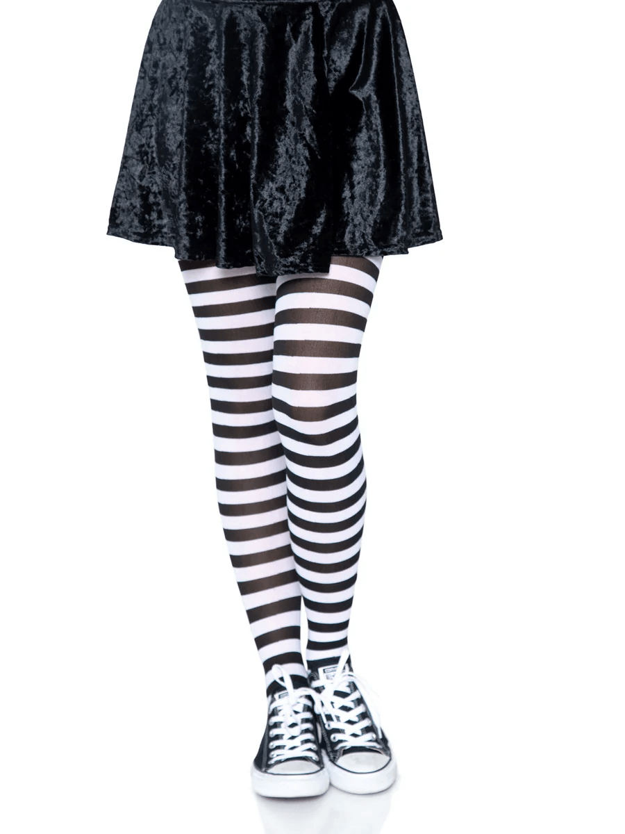 Leg Avenue Nylon Striped Tights Black White OS worn with a black skirt and sneakers, showcasing stylish black and white stripes.