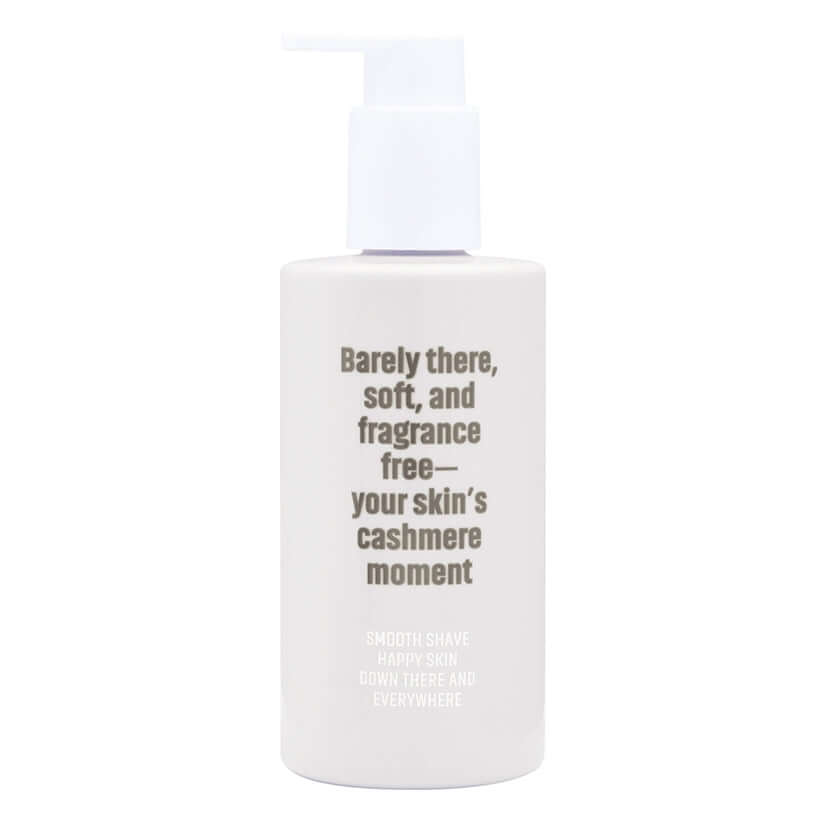 Coochy Shave Cream Au Natural 8 Oz in a pump bottle, promoting a smooth and irritation-free shave.