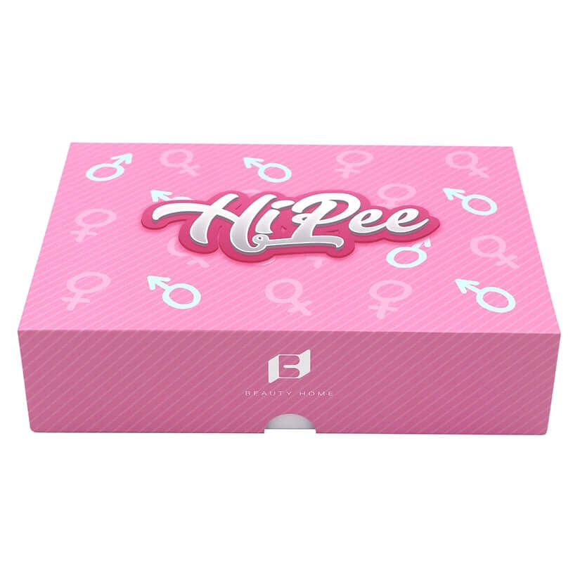 Box packaging for Tracys Dog Hi Pee Remote Control Vibrator featuring pink design and gender symbols.