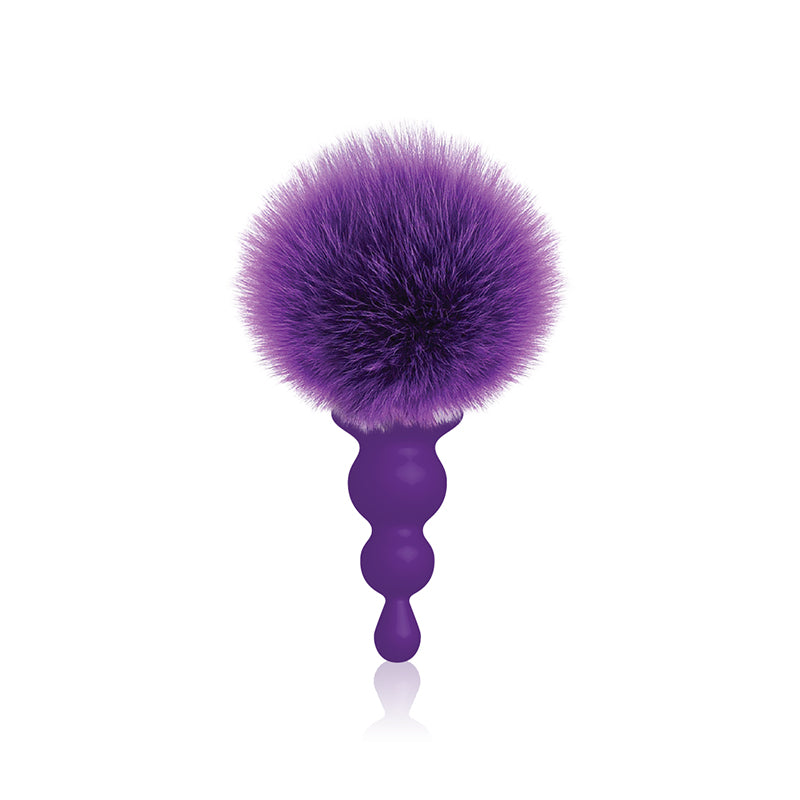 The 9s Cottontails Bunny Tail Butt Plug Beaded Purple showcasing a soft faux fur tail and beaded silicone shaft.