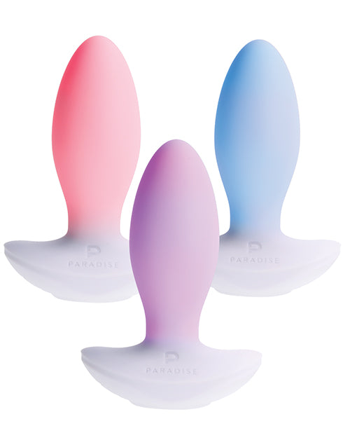 Illumination THE Plug Vibrator White in pink, purple, and blue colors showcased together for a premium sensory experience.