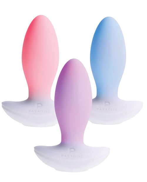 Illumination THE Plug Vibrator White in pink, purple, and blue colors showcased together for a premium sensory experience.
