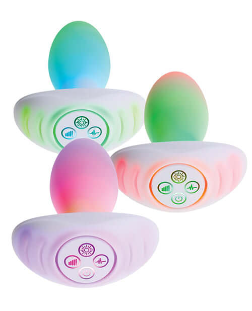 Illumination THE Plug Vibrator White featured in vibrant colors and customizable buttons for personalized experiences.