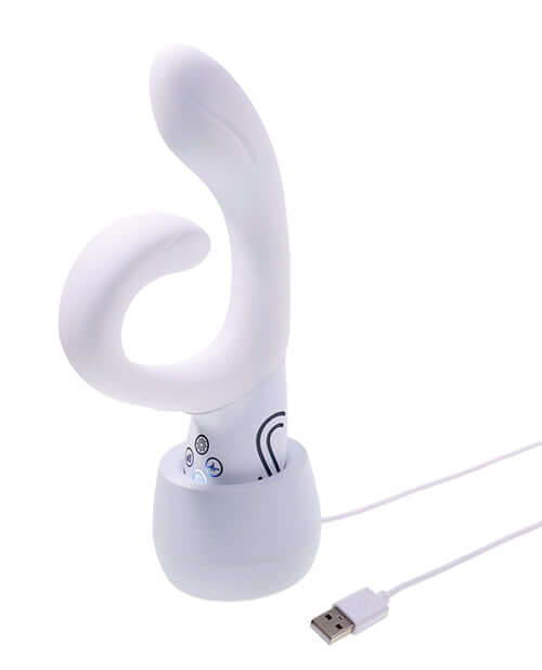 Illumination THE Rabbit Vibrator White charging in its dock with USB cable, showcasing innovative design and dual stimulation features.